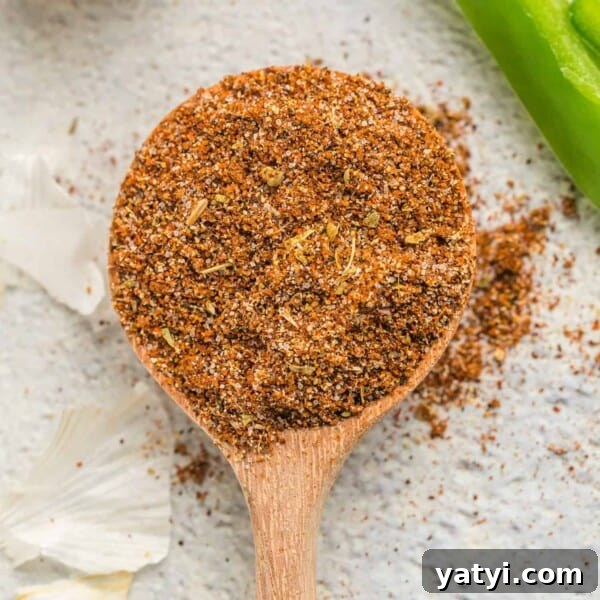 How to Use Cajun Seasoning: Flavor Tips, Recipes & Pairings 12 Fajita seasoning on a wooden spoon.