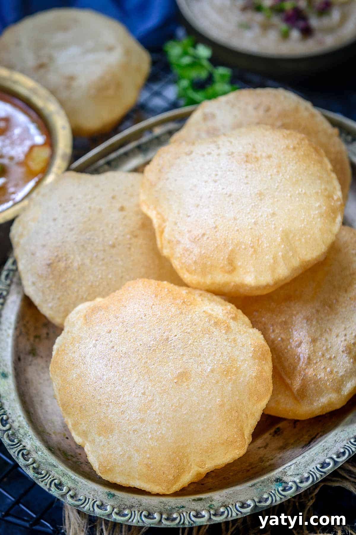 Poori served on a plate.