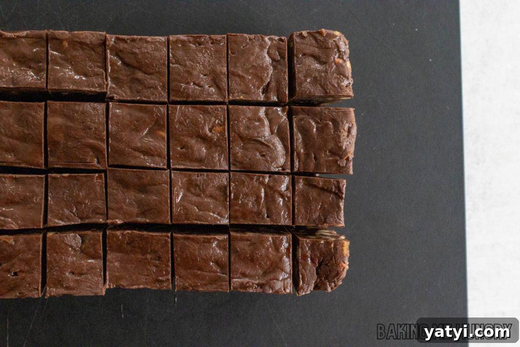 3-Ingredient Microwave Fudge Recipe: Quick Chocolate Fudge 9 fudge on cutting board cut into squares