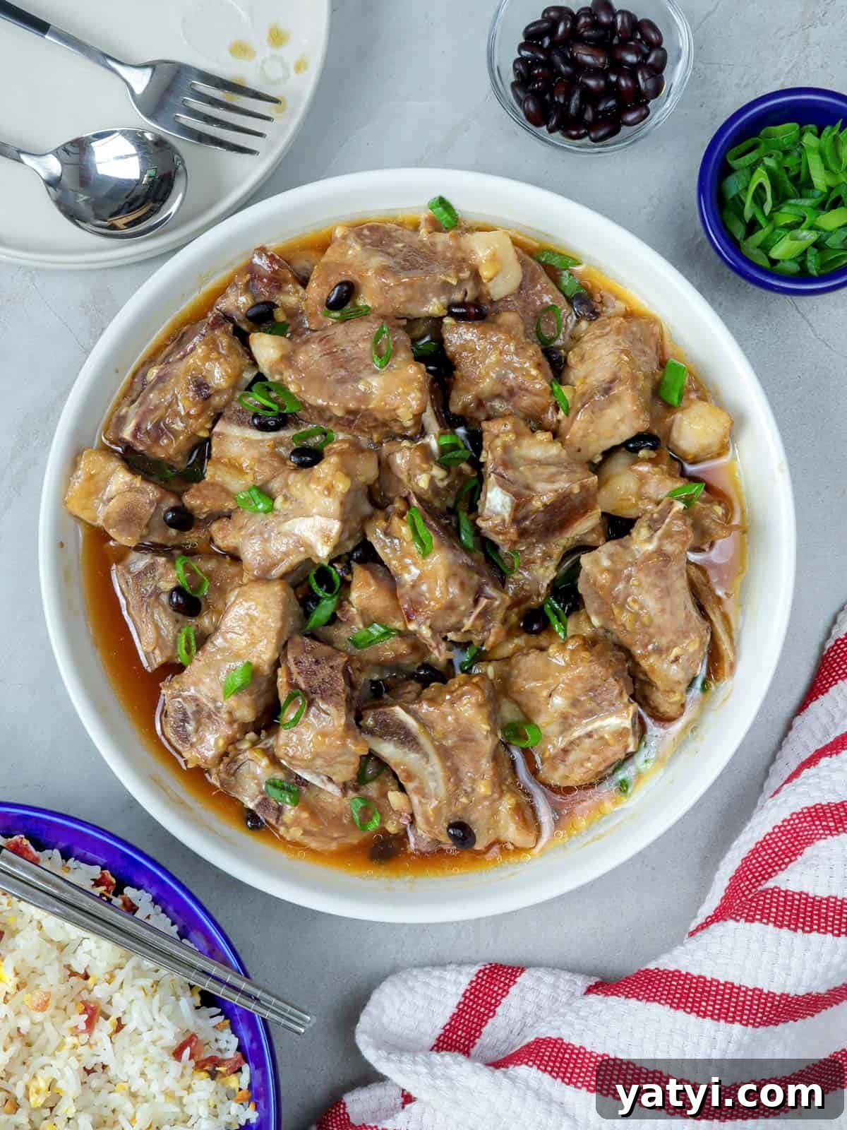Steamed Spareribs with Fermented Black Beans Recipe 5 Steamed Spareribs with Black Beans in a white serving bowl