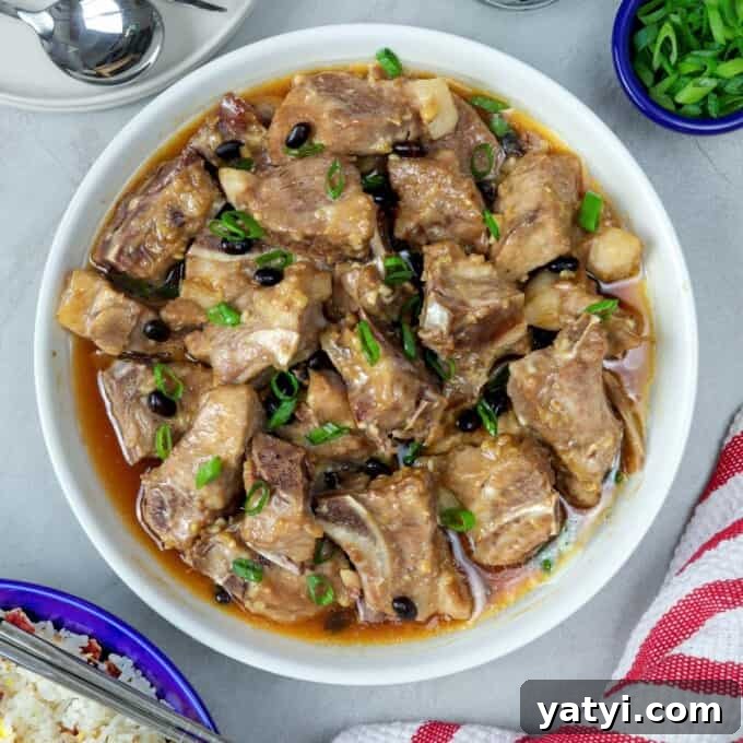 Steamed Spareribs with Fermented Black Beans Recipe 6 Steamed Spareribs with Black Beans in a white serving bowl