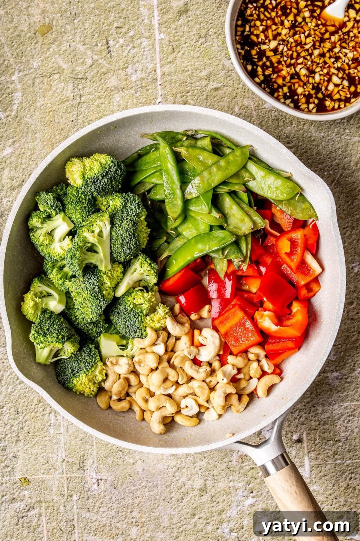 One-Pan Cashew Chicken Stir-Fry Recipe 9 How to Make One Skillet Cashew Chicken Step 3 - Olivia Adriance