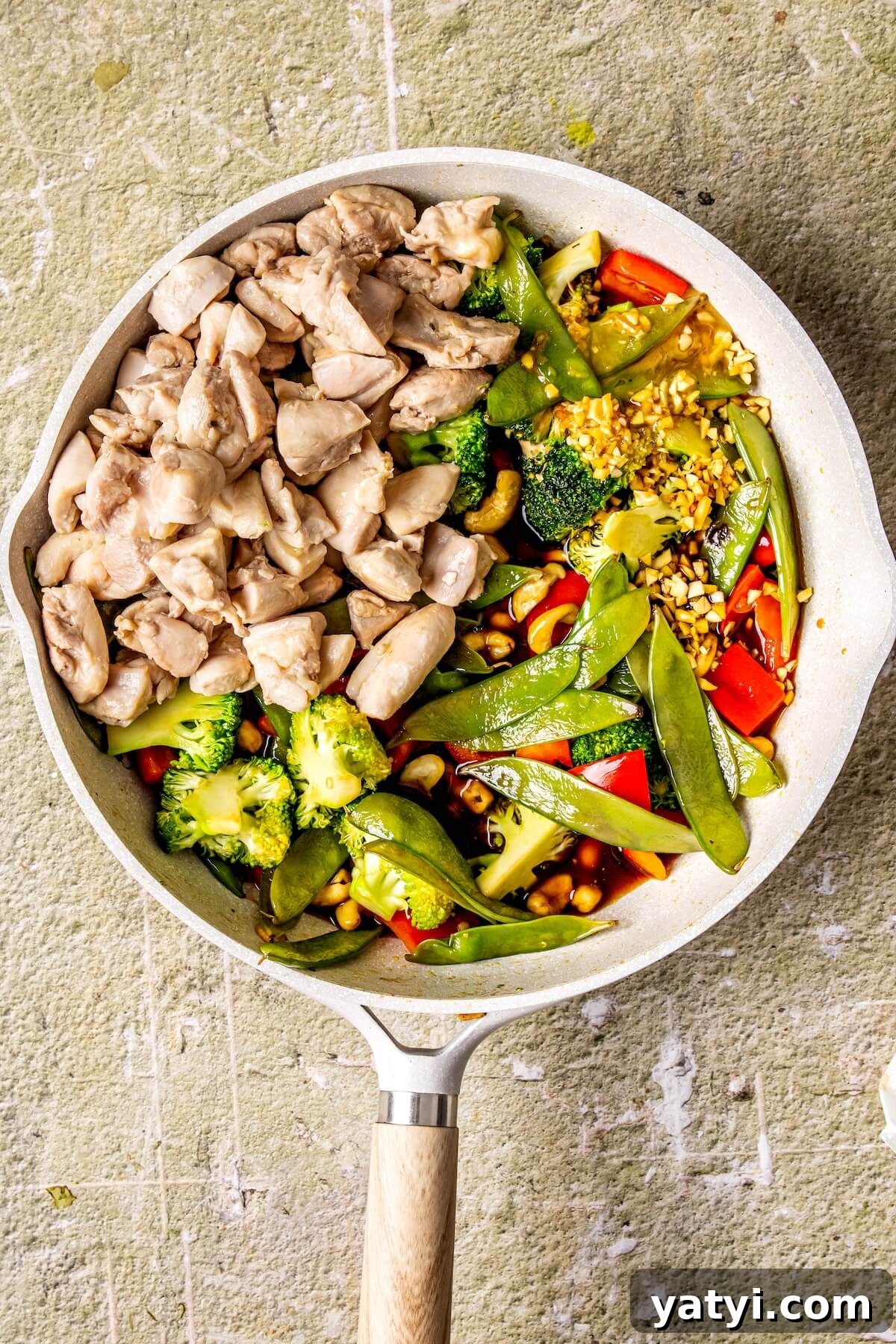 One-Pan Cashew Chicken Stir-Fry Recipe 10 How to Make One Skillet Cashew Chicken Step 4 - Olivia Adriance