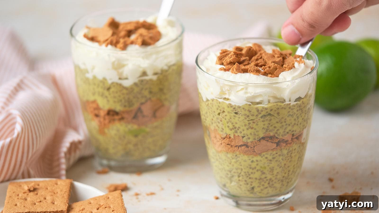 21 Snack Swaps That Beat Junk Food Without Sacrificing Flavor 10 Two glasses of chia pudding topped with whipped cream and crumbled biscuits.