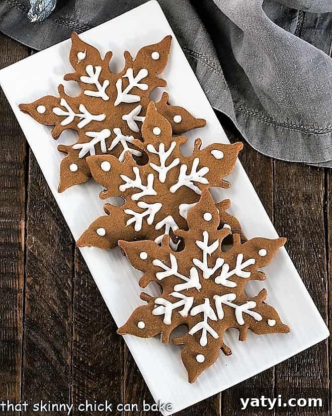 Classic Homemade Gingerbread Recipe: Perfect for Holiday Baking 4 Overhead view of 3 gingerbread snow flakes.