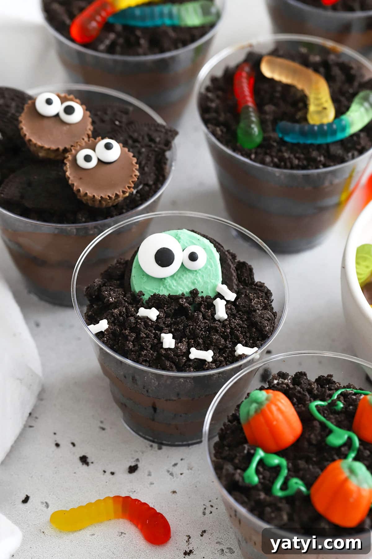 Gluten-Free Chocolate Dirt Pudding Recipe That Wows 7 gluten-free Halloween dirt pudding decorated to look like bats, monsters, pumpkins, and more