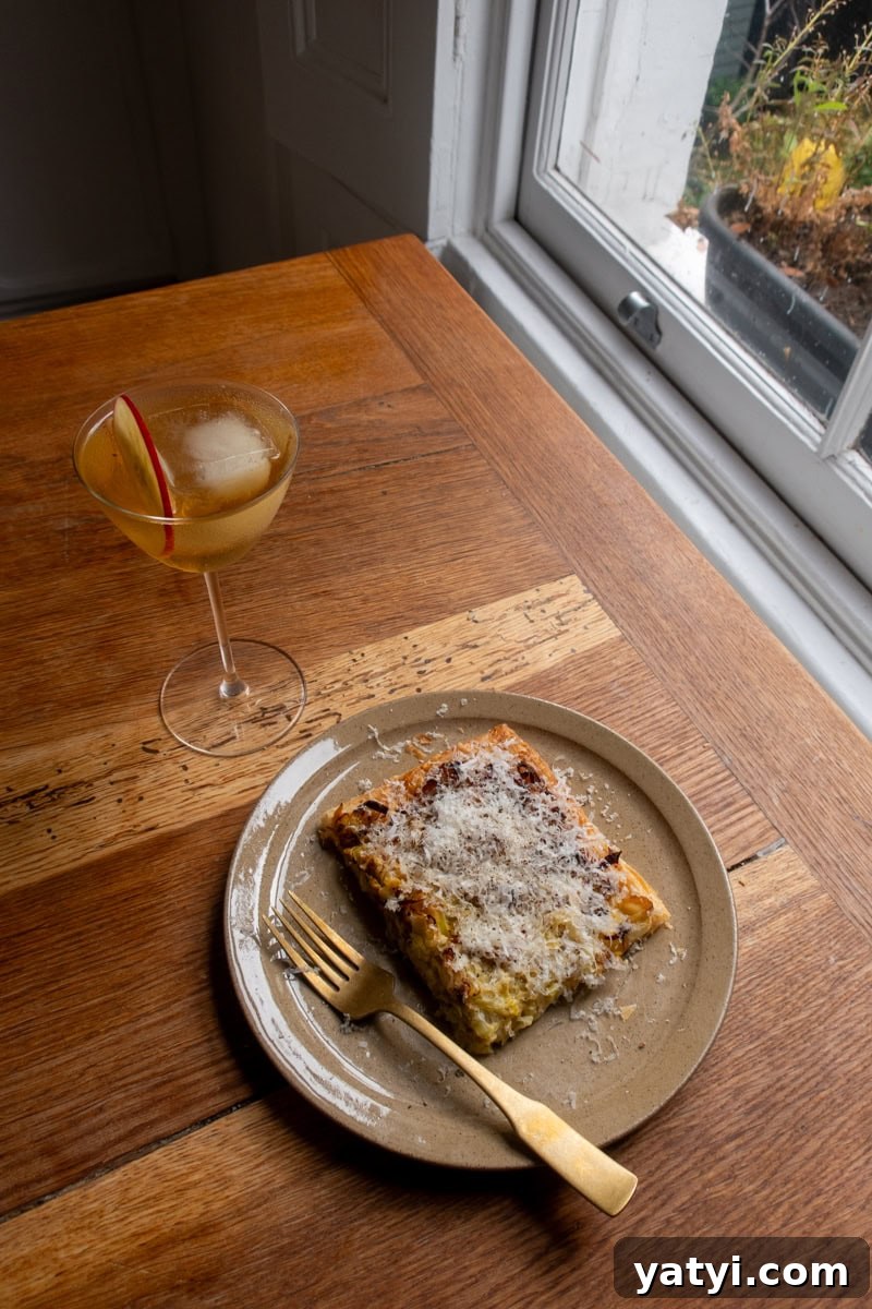 Leek, Gruyère & Parmesan Tart Recipe for Savory Brunch 4 Leek, Gruyere & Parmesan Tart with a cider cocktail - Georgie Eats