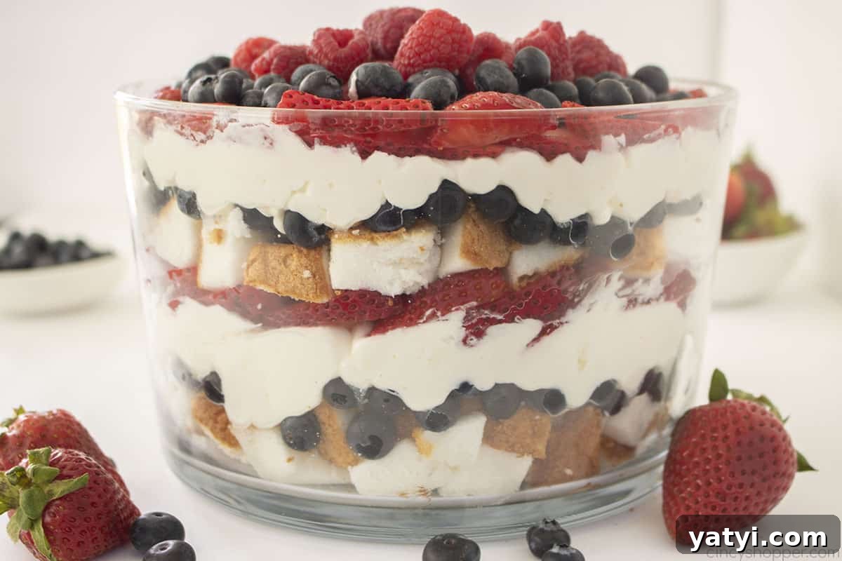 Berry Trifle Recipe: Layered Summer Dessert with Fresh Berries 6 Layered trifle dish with berries.