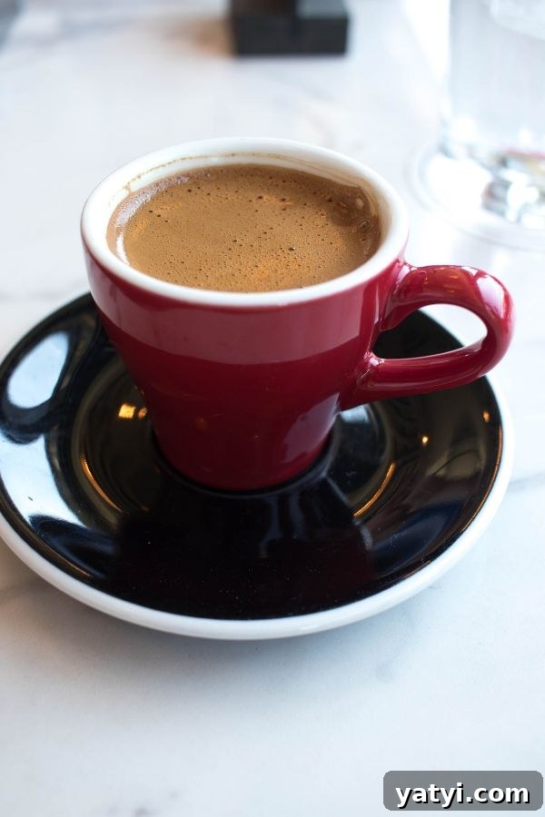 Greek Coffee Culture: A Guide to Greece’s Coffee Traditions 2 Greek coffee in a small red espresso cup, how to enjoy coffee in Greece!