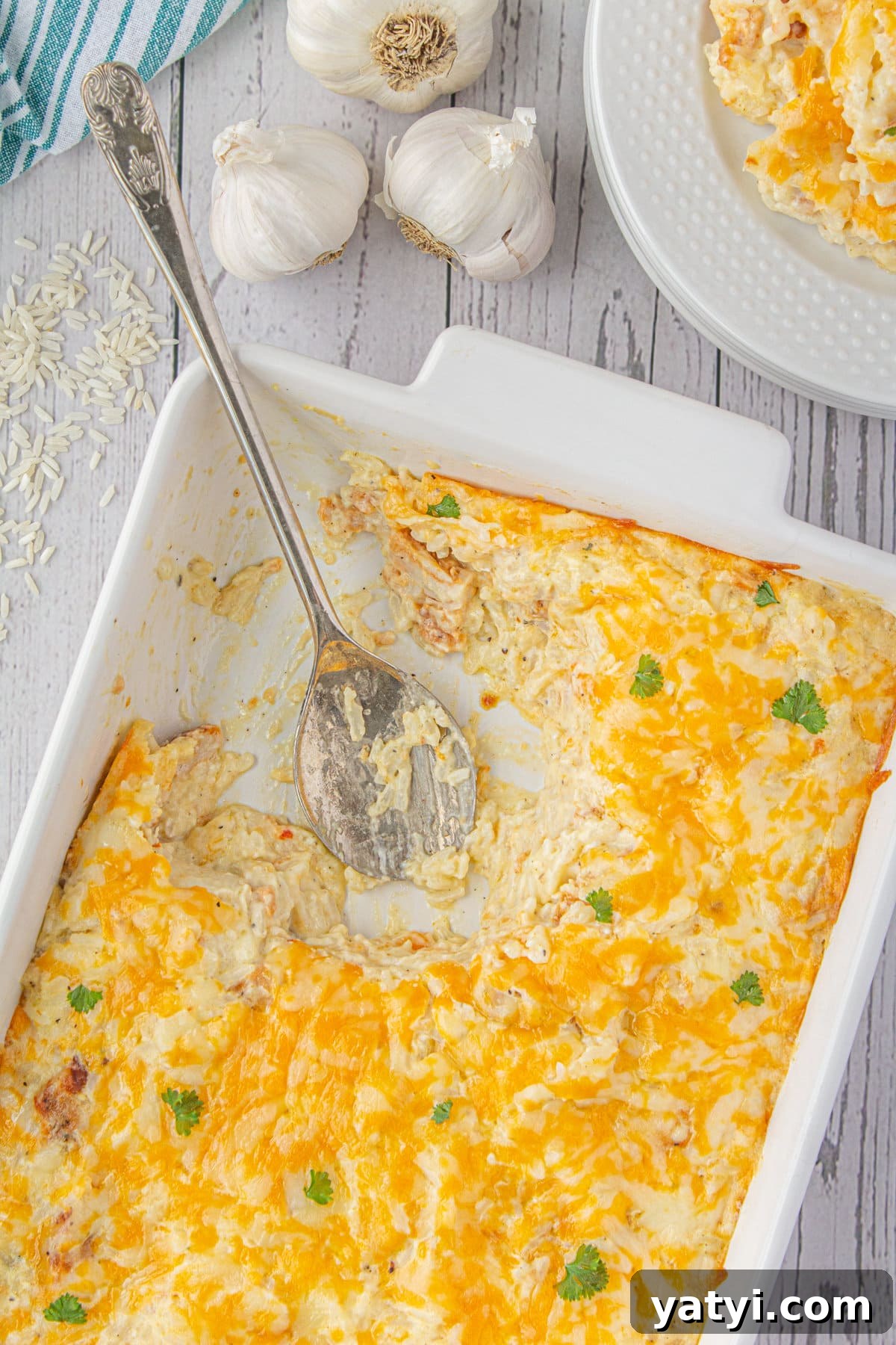 Creamy Angel Chicken and Rice Casserole Recipe 9 A scoop of angel chicken and rice casserole removed from the casserole dish.
