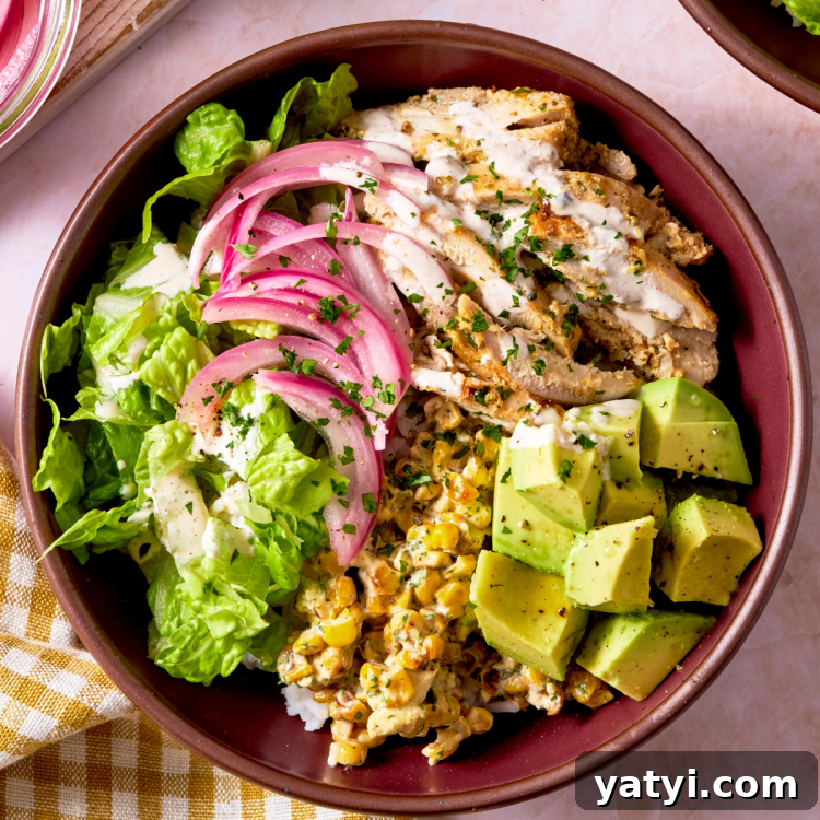 Weeknight Dinner Plan: Week 1 Meals & Grocery Guide 3 Street corn bowl assembled and topped with toppings.