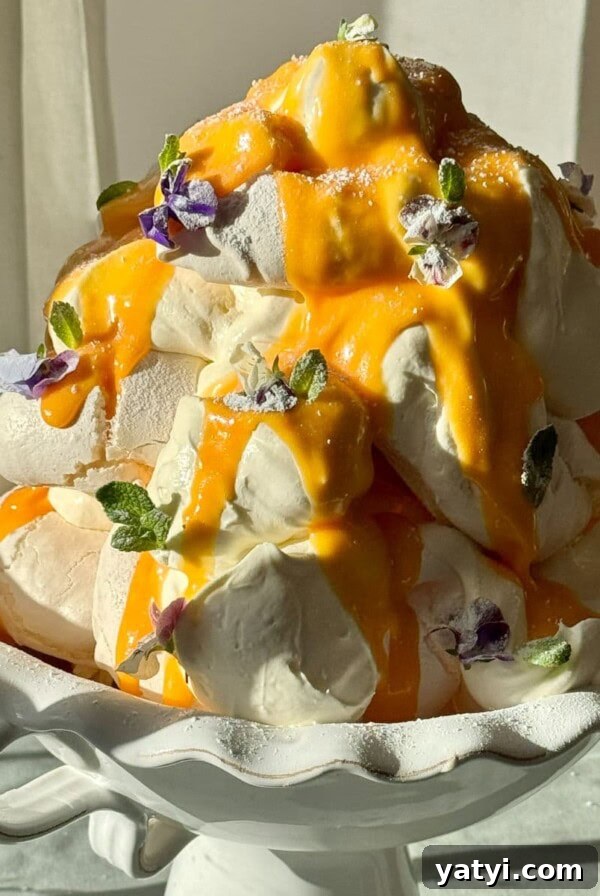 Lemon Meringue Tart Recipe with Crispy Crust and Fluffy Meringue 17 lemon meringues tower.