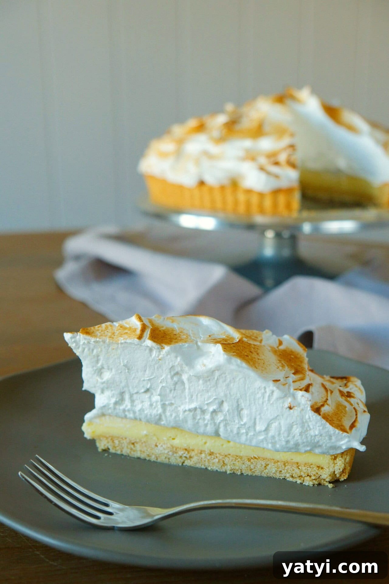Lemon Meringue Tart Recipe with Crispy Crust and Fluffy Meringue 3 Slice of lemon meringue tart