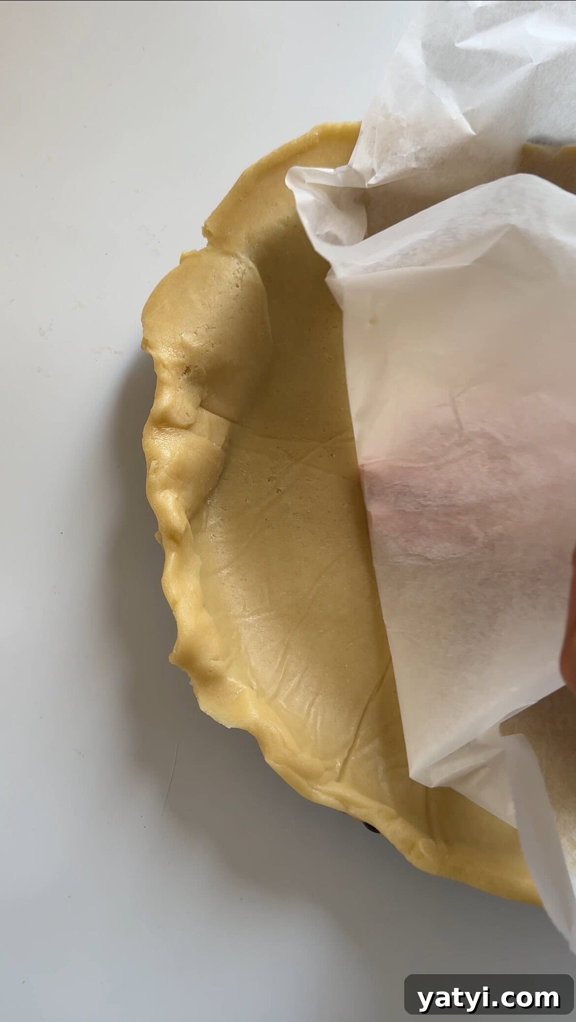 Lemon Meringue Tart Recipe with Crispy Crust and Fluffy Meringue 5 lining tart tin with pastry