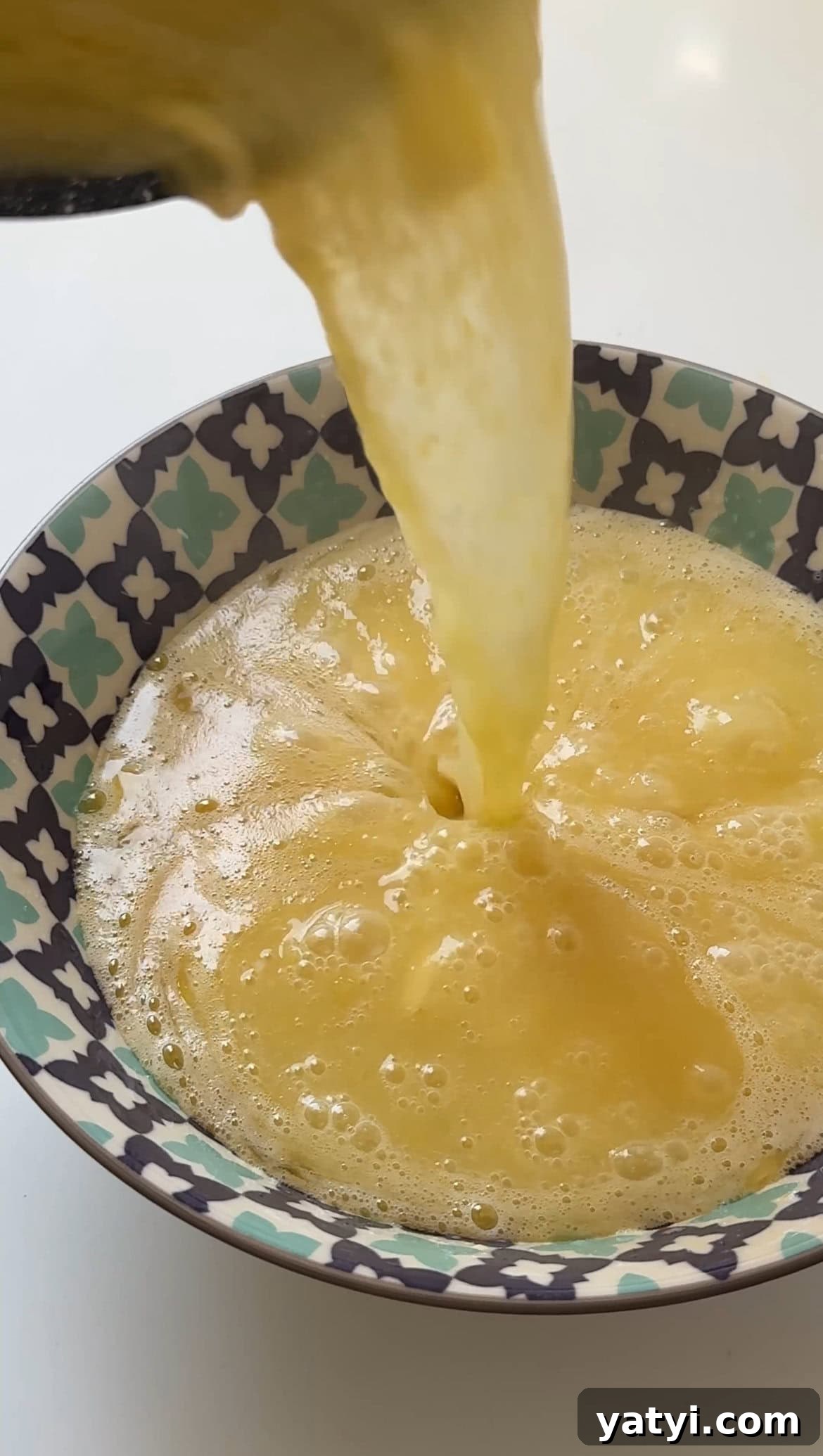 Lemon Meringue Tart Recipe with Crispy Crust and Fluffy Meringue 10 straining lemon curd